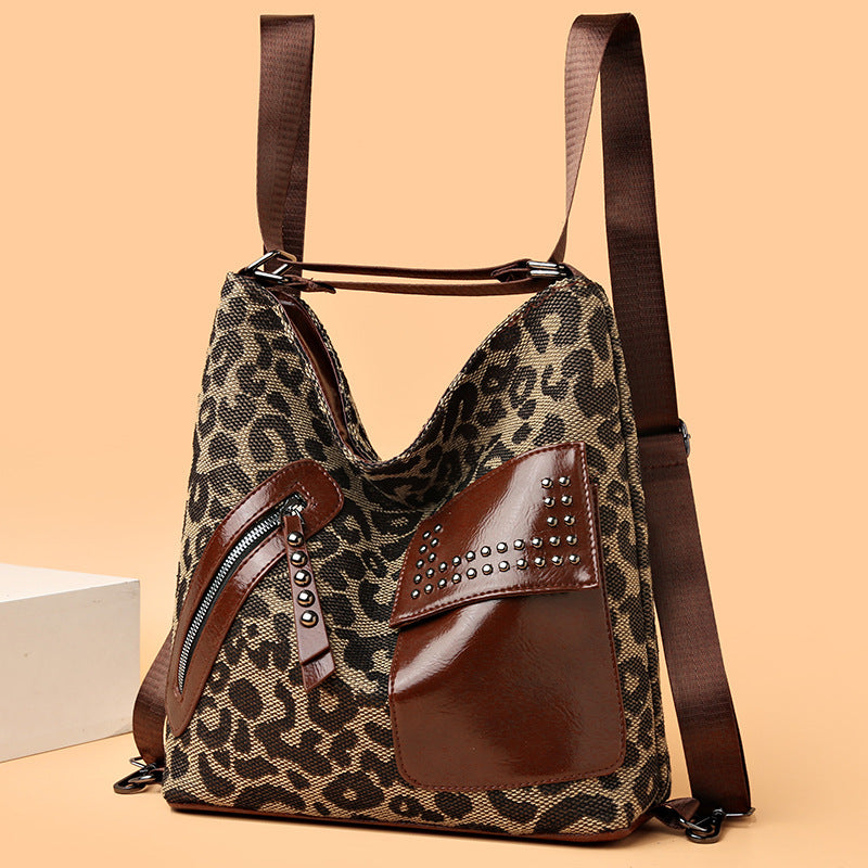 Houndstooth Chic: Rivet-Embellished Leopard Backpack